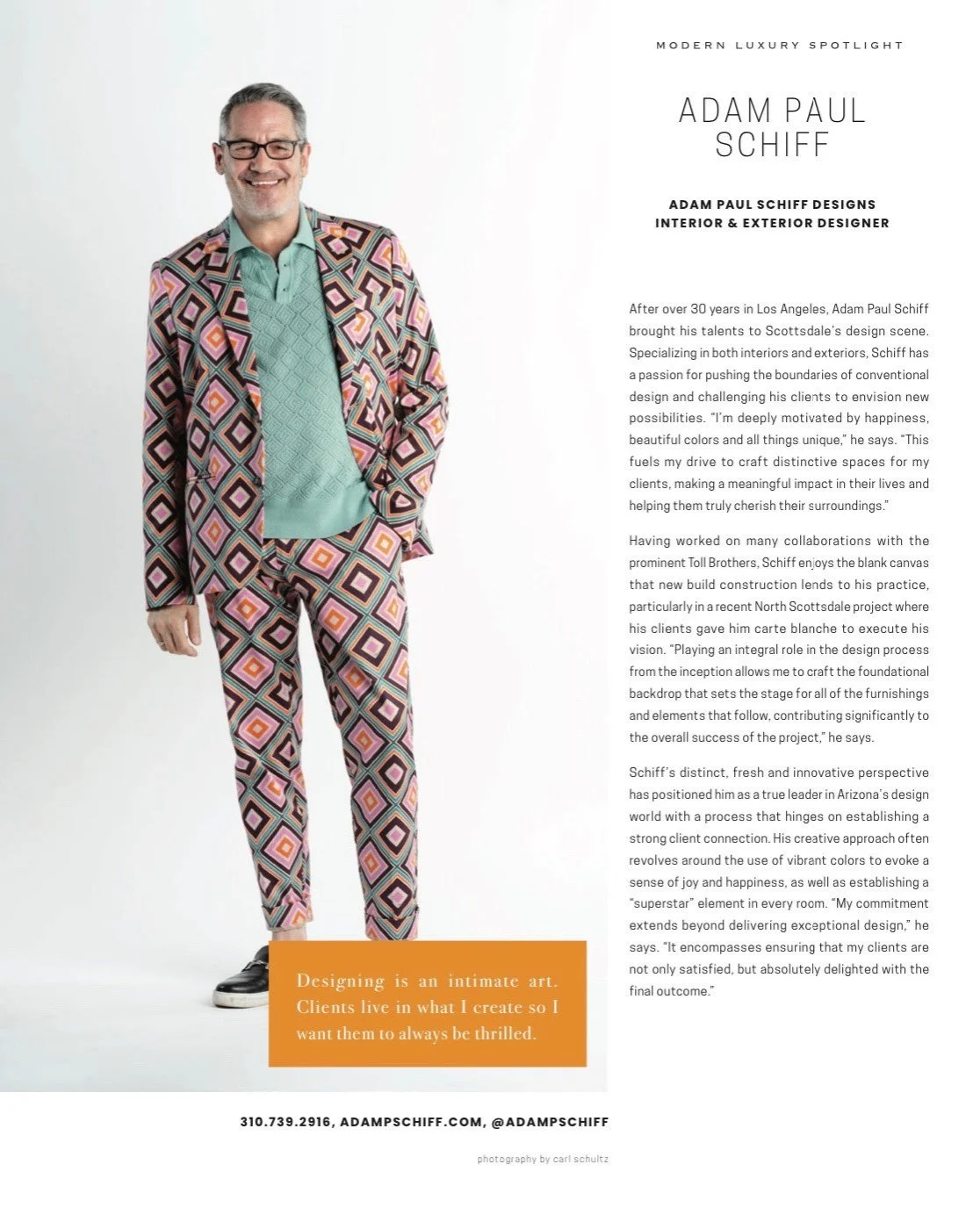 A man wearing a colorful geometric patterned suit, light green shirt, and glasses, standing against a white background. The image features a magazine-style layout with text about interior and exterior designer Adam Paul Schiff, including a quote in an orange box at the bottom.
