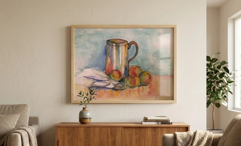 Title: Still Life with Pitcher and Apples

Medium: Watercolor and ink on paper

Dimensions (Artwork): 20×30

Orientation: Horizontal / Landscape

Frame Details: Light natural oak wood frame with clear protective glass coating, presented without a mat