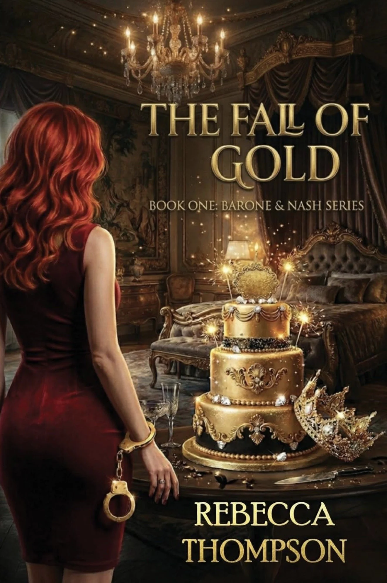 A woman with long red hair wearing a dark red dress and a gold bracelet, standing in a luxurious room with a large gold and black decorated cake with sparklers, a champagne glass, and a crown next to the cake, with the text 'The Fall of Gold Book One: Barone & Nash Series' and 'Rebecca Thompson' over the scene.