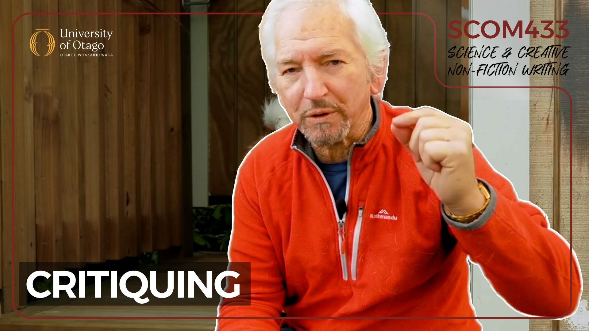 A man with gray hair and a beard, wearing a red jacket, appears to be speaking or explaining something, with one hand raised in a gesture. The background features wooden paneling and a partly visible door. The image includes overlays with text: "University of Otago," "CRITIQUING," and "SCICOM433 Science & Creative Non-Fiction Writing."