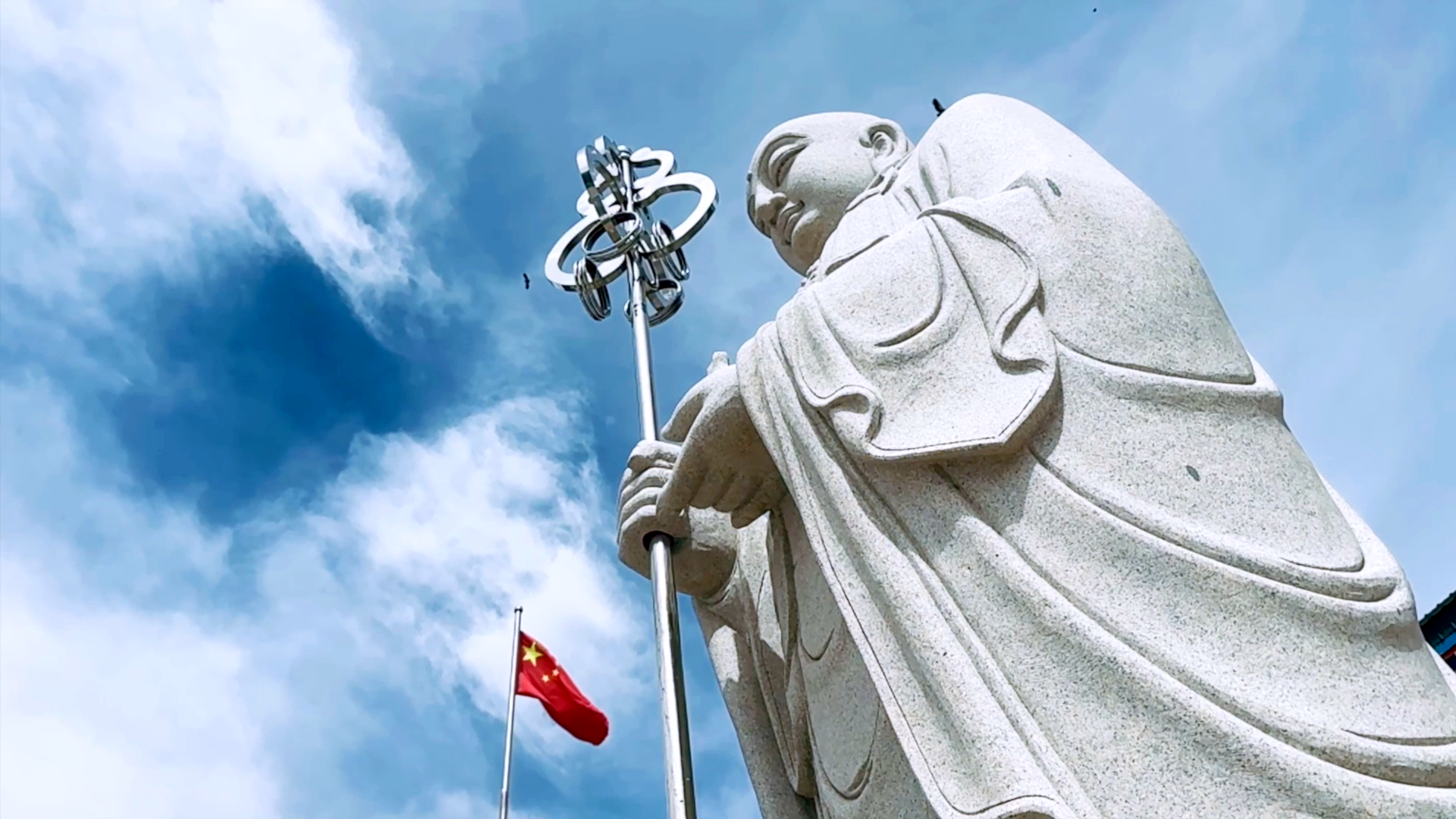 Low angle shot of a statue of a Buddha in China