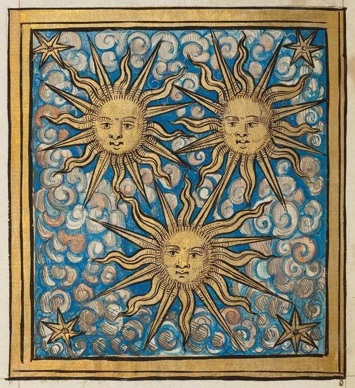 A painting of three stylized suns with human faces and radiating rays, set against a blue and white swirling sky with smaller stars in the corners.