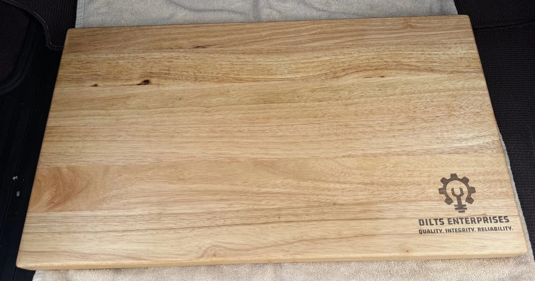 Custom lasered logo cutting board.