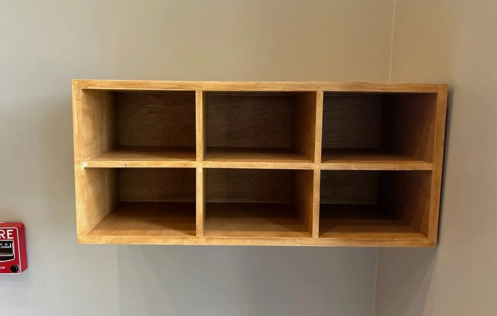 Wooden cubical mail shelf mounted 