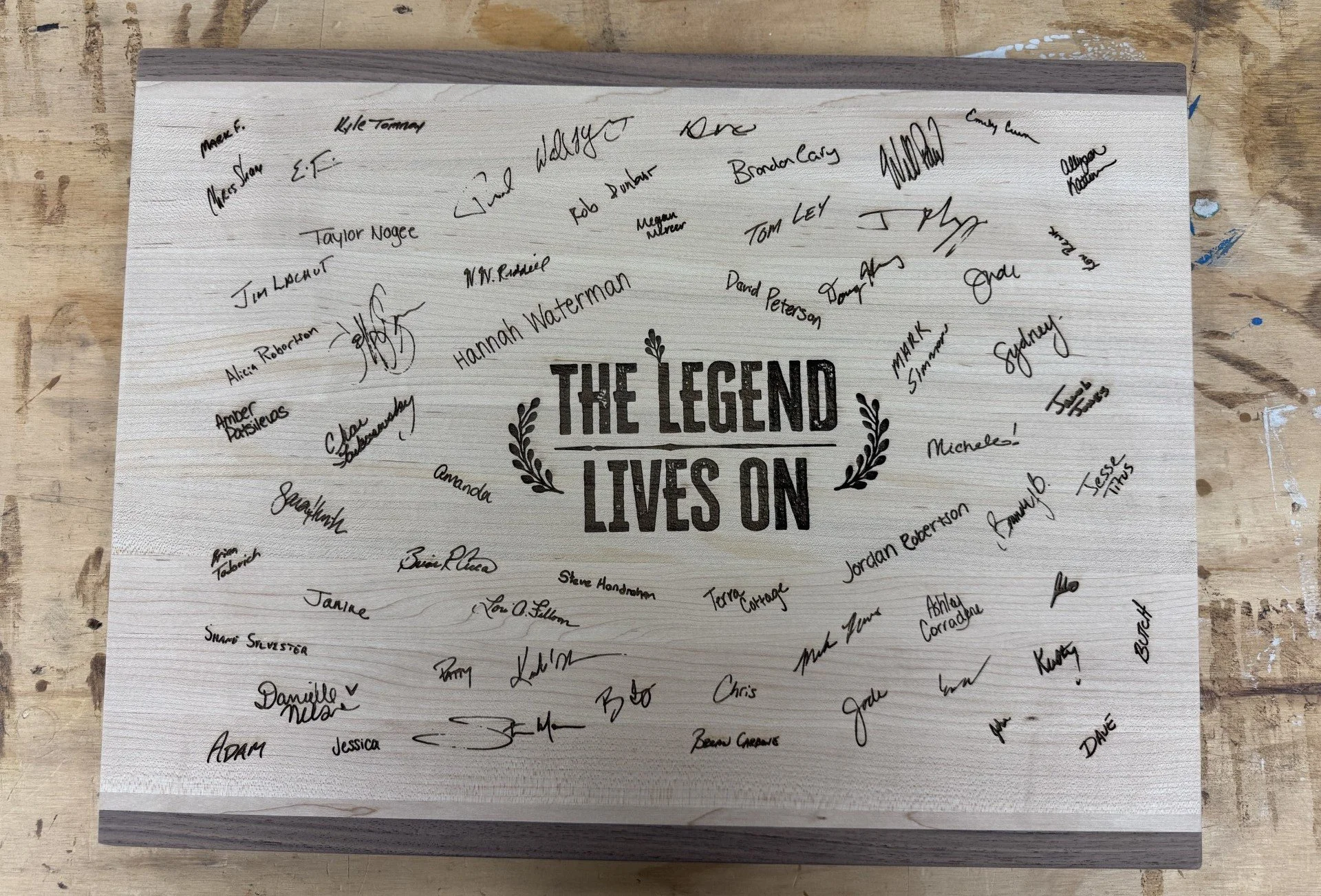 Retirement cutting board for a manager with all of the names of the employees