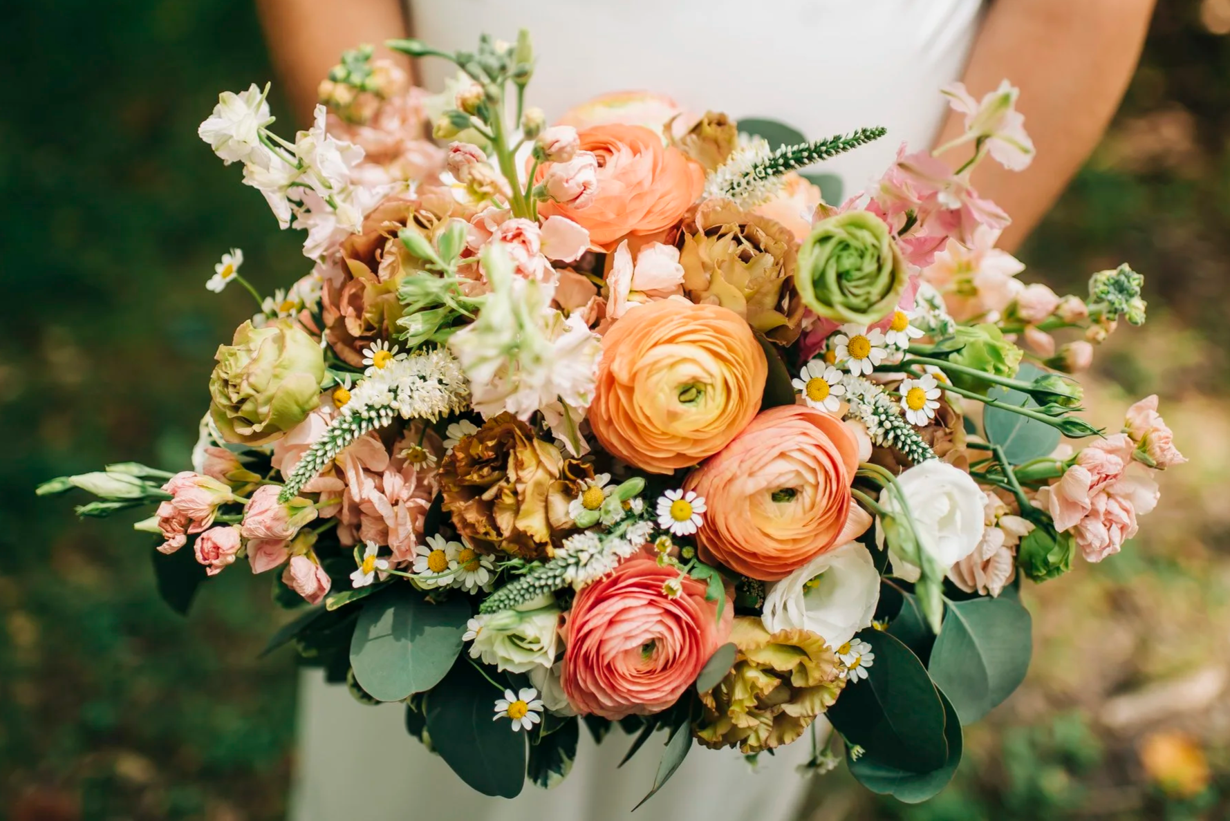 Colorful bridal bouquet photographed during a wedding by Northbound Images.