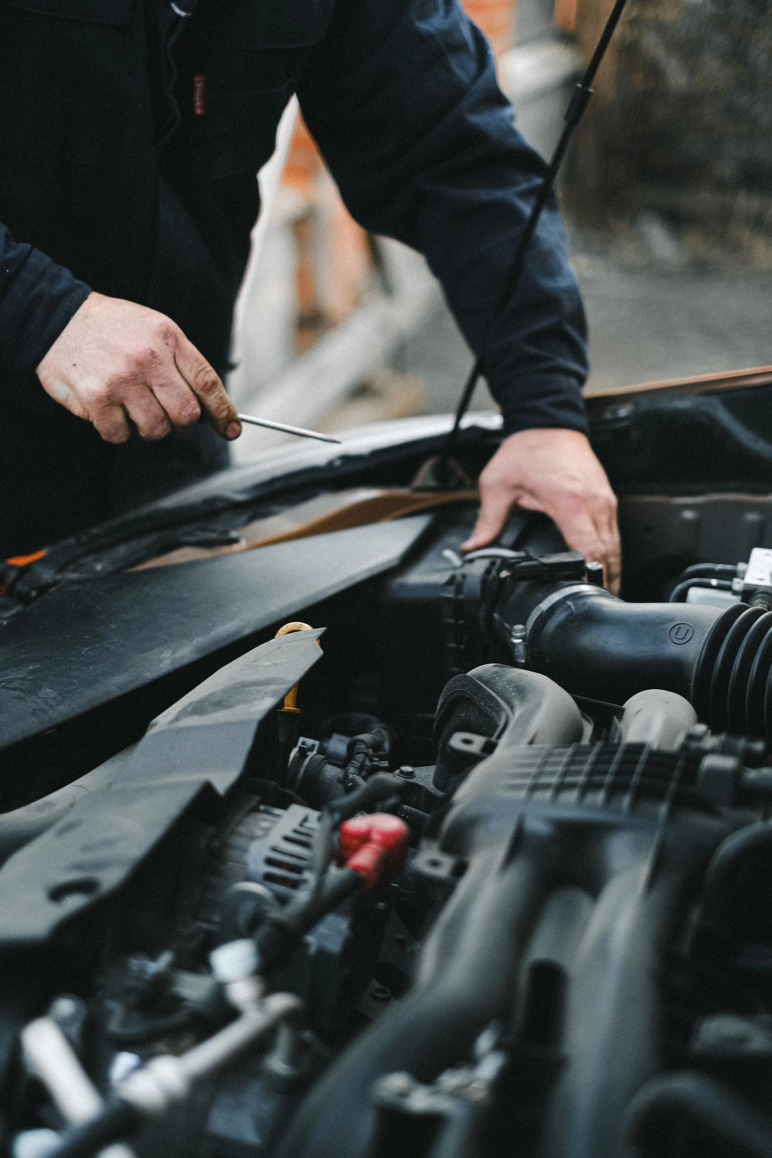 mechanic working on car