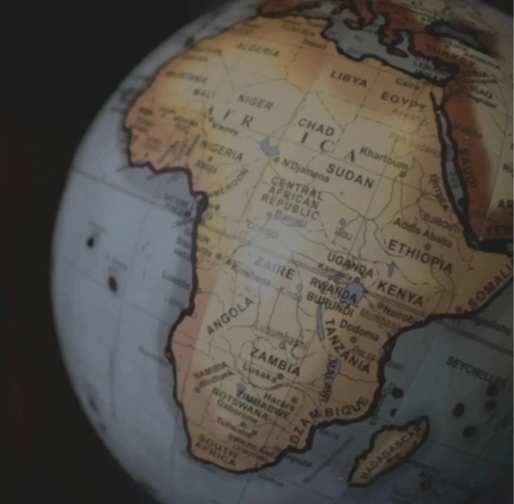 World globe focusing on Africa showing countries like Nigeria, Egypt, South Africa, Kenya, and Ethiopia.