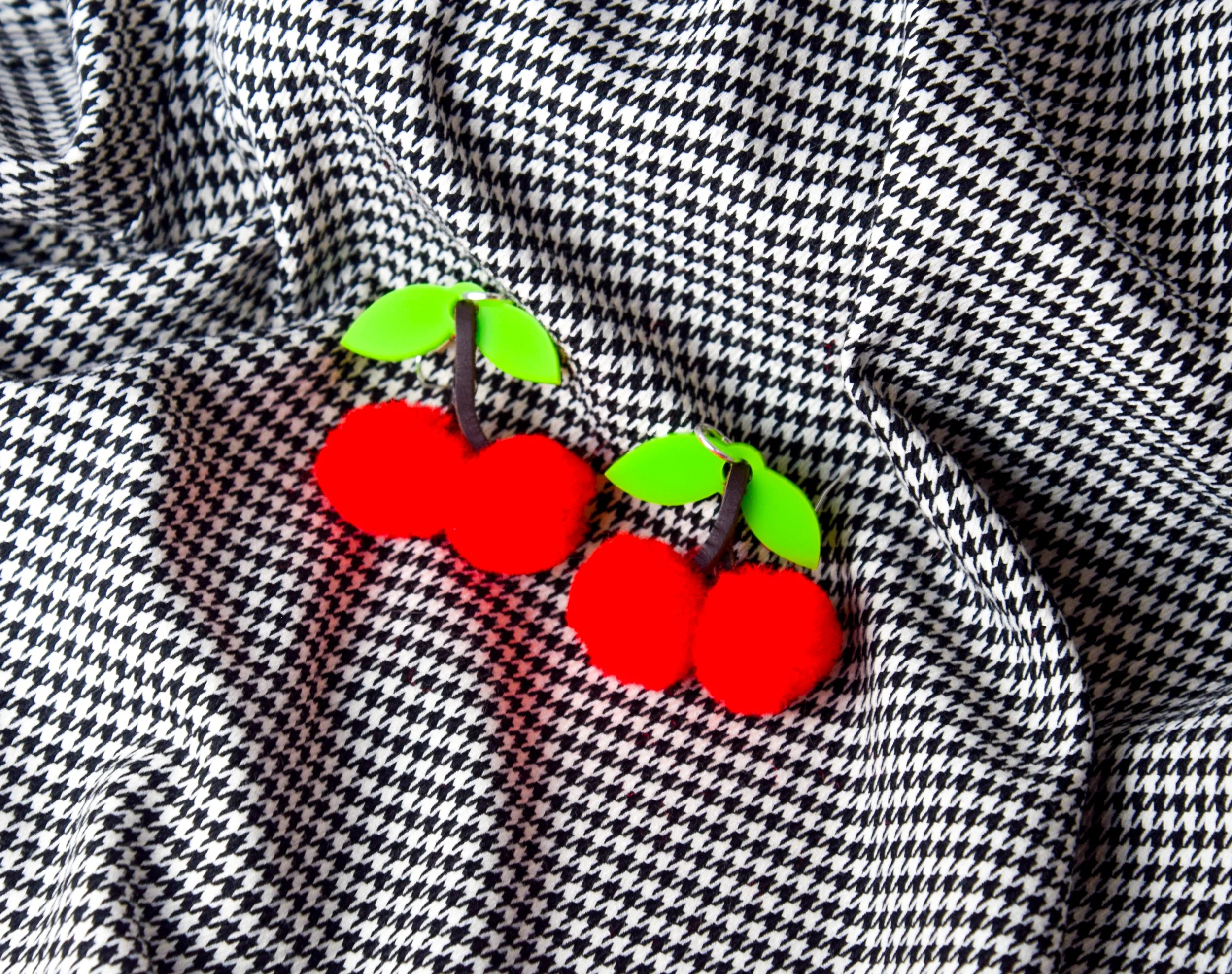 Cherry Pom Pom Earrings by So Camp! With Houndstooth Background.jpg