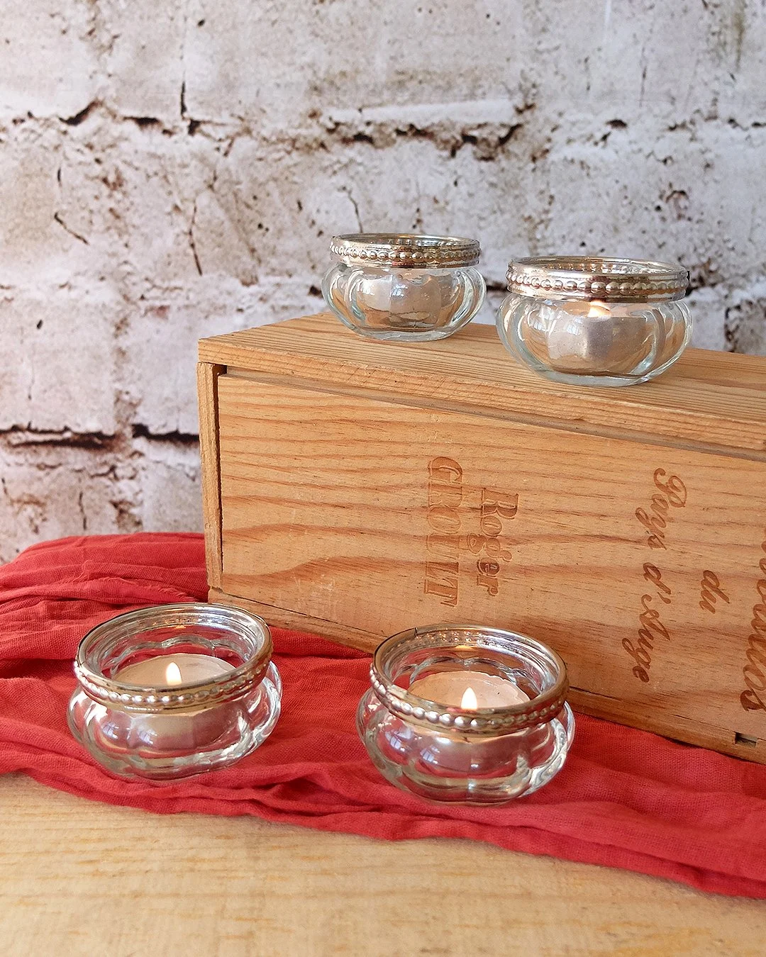 Glass tea light holder