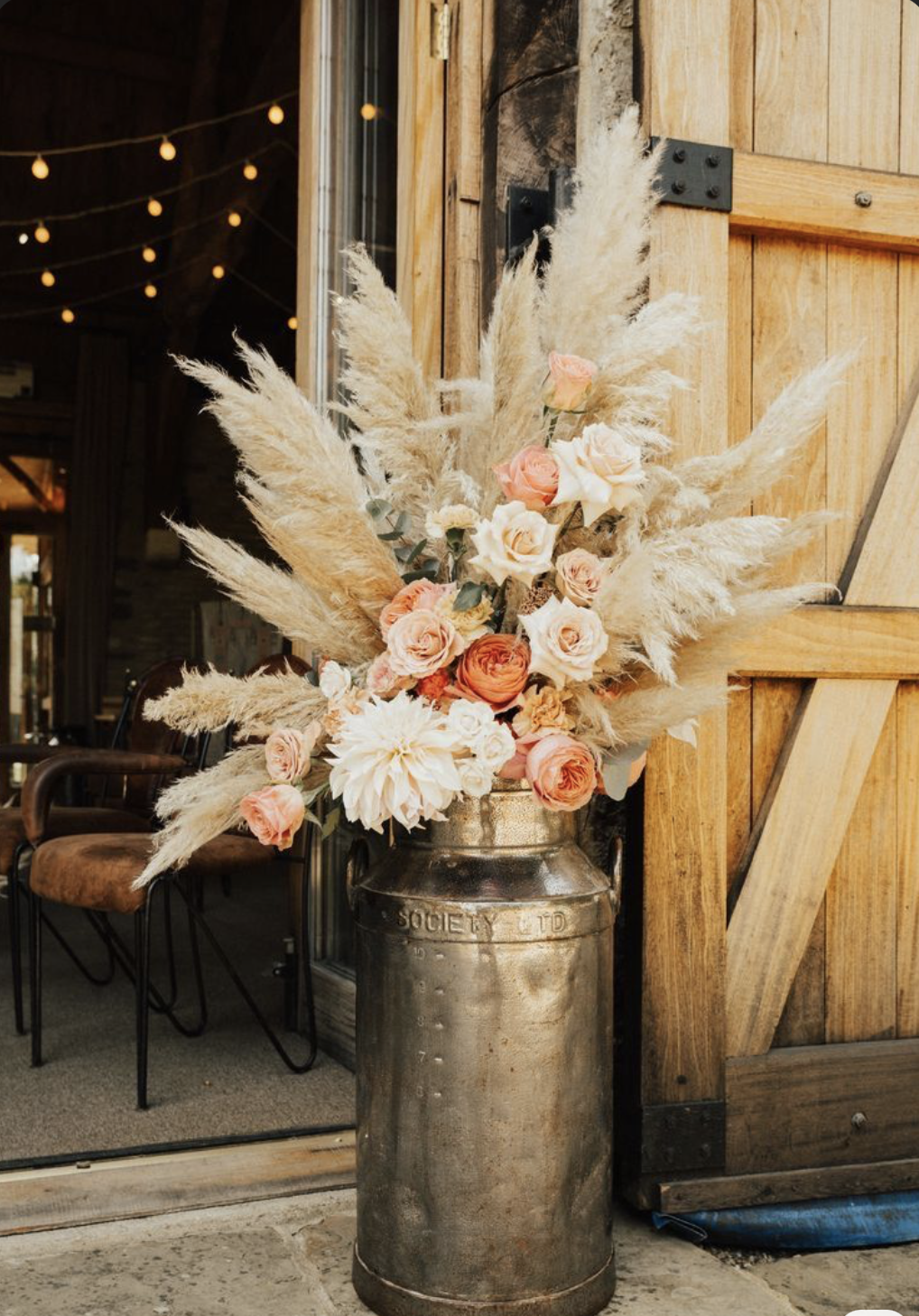 Milk churn dried floral arrangement
