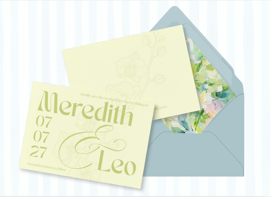 A wedding invitation save the date card, inside a cool decorated blue envelope with custom watercolor liner.