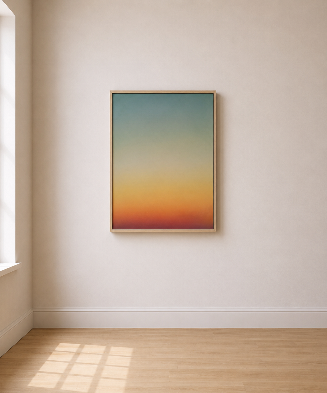 Framed abstract landscape painting of a sunset or sunrise on a plain white gallery wall.