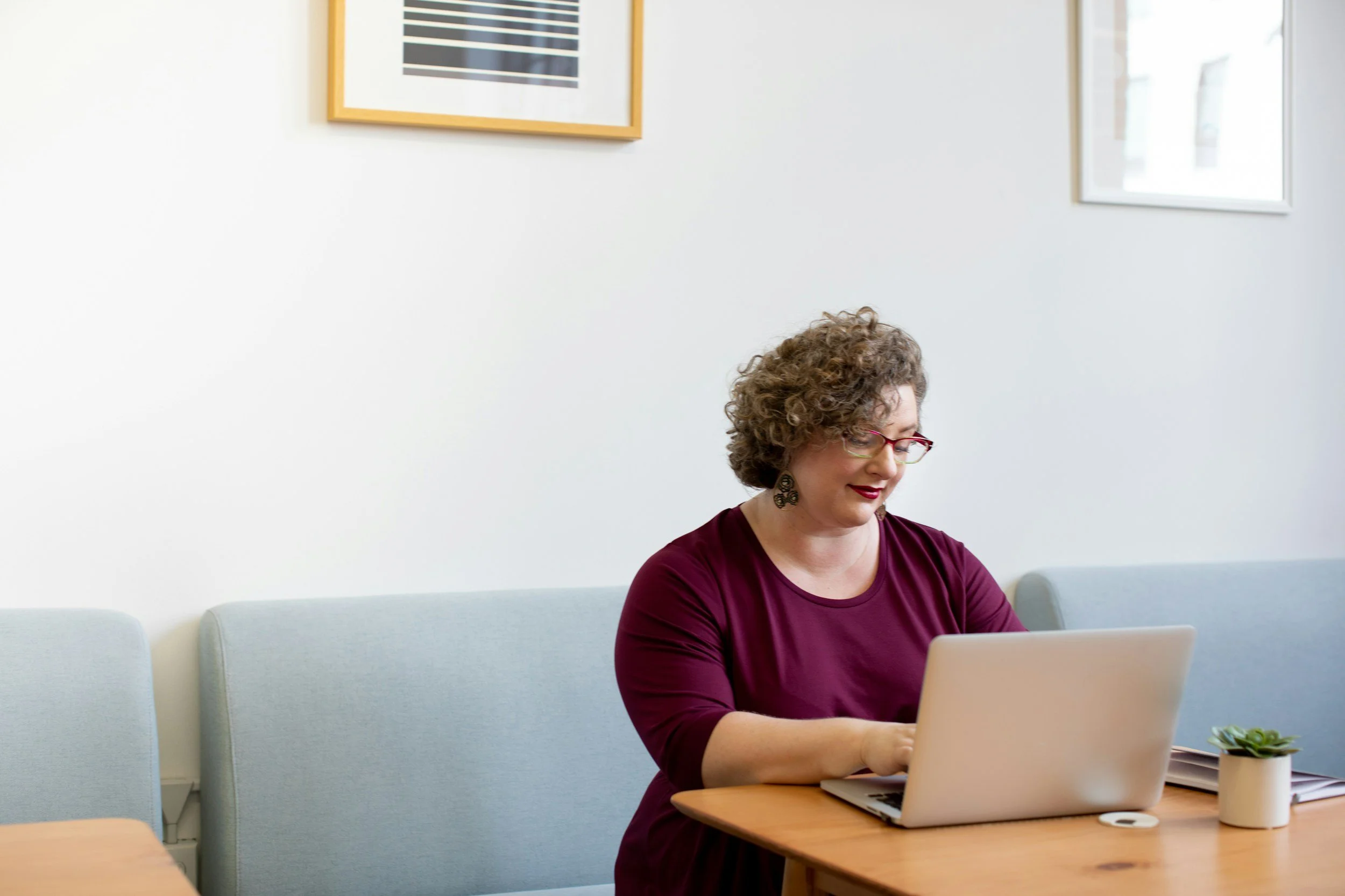 A woman working on a laptop