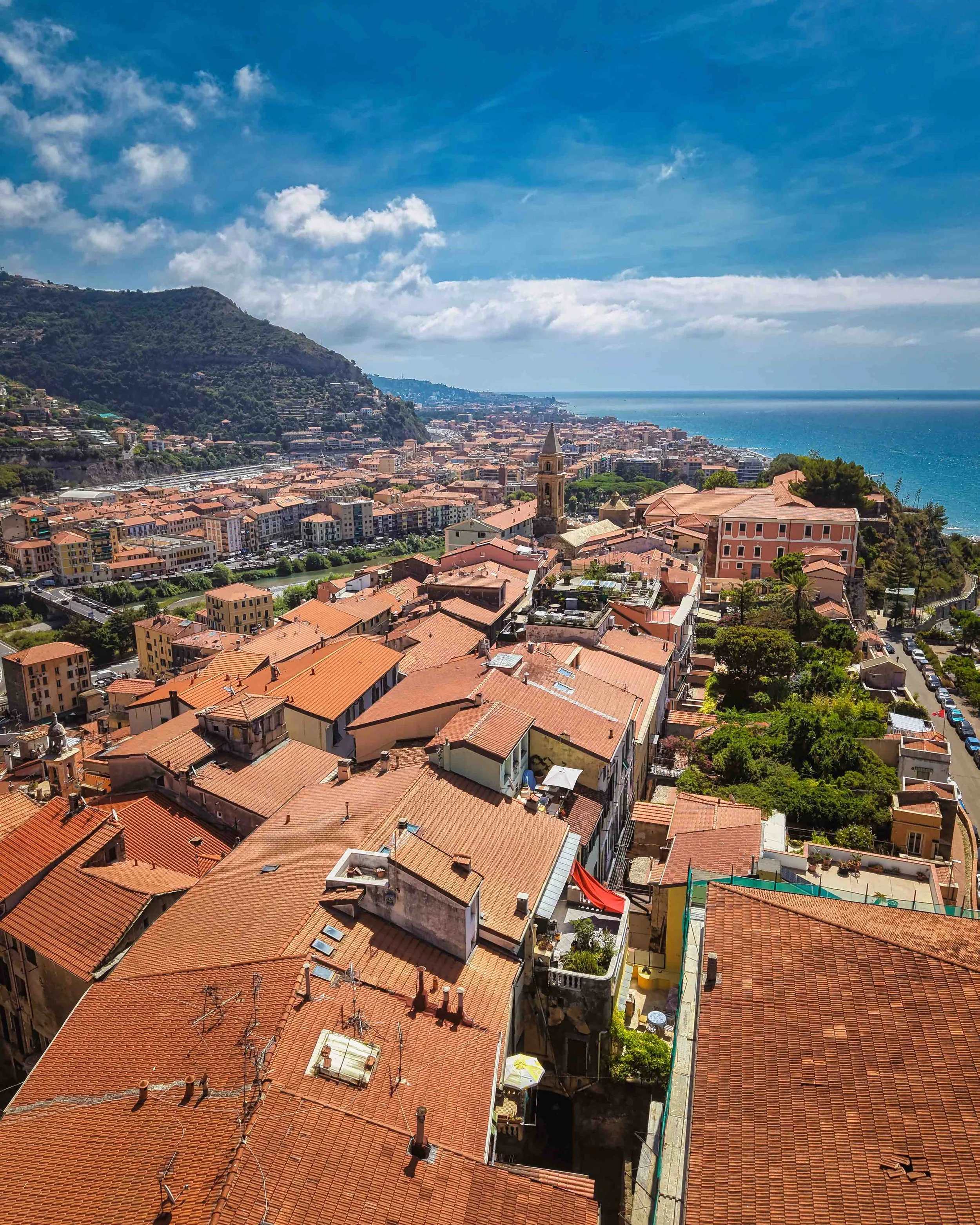 Panoramic view over Ventimiglia Alta in Liguria, overlooking the historic old town, Mediterranean coastline and surrounding hills.