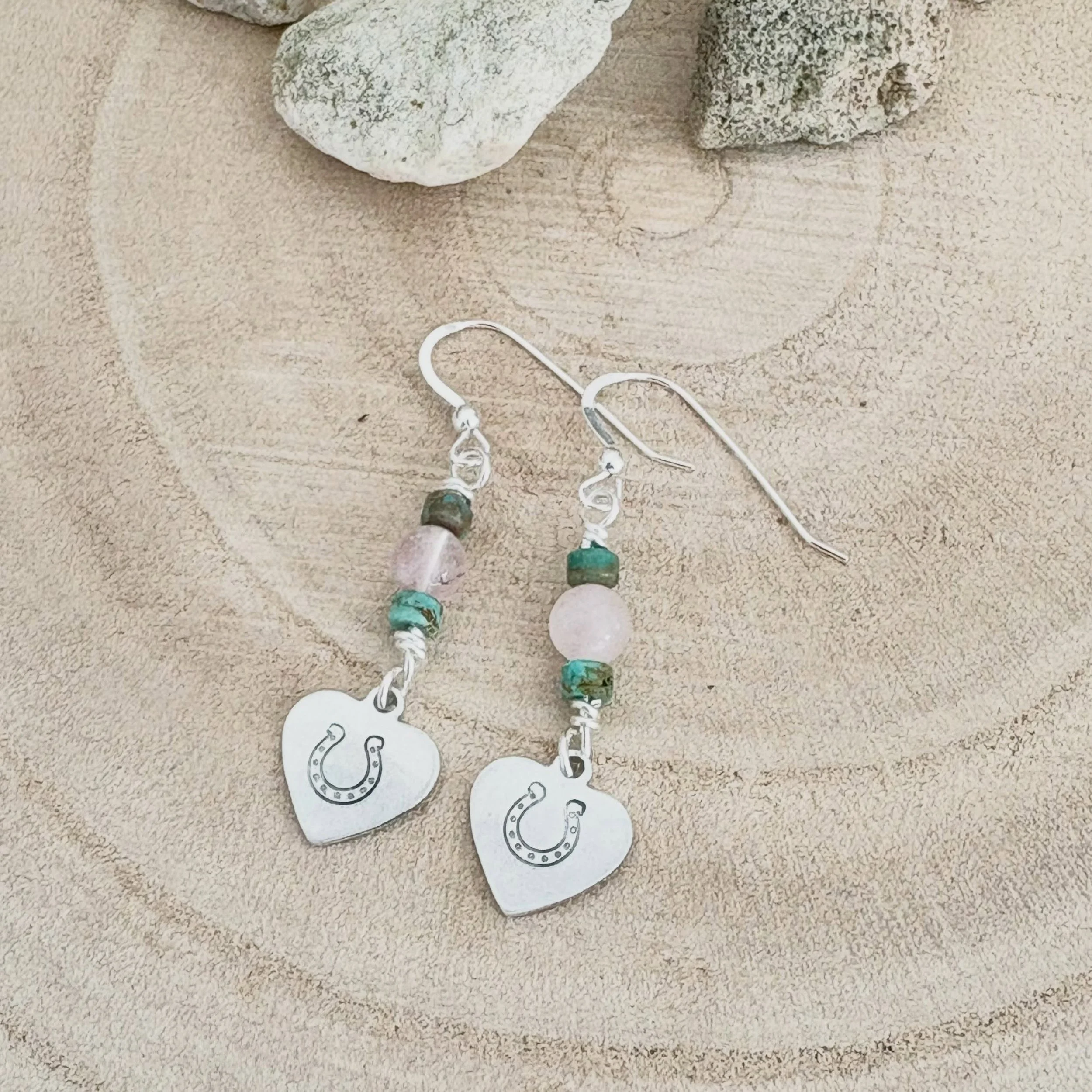 Woah Nelly! 🤠🐴 These beautiful horse shoe earrings are perfect for you or your horse loving friends! 💛 This pair is rose quartz with genuine turquoise, but I also have variations in carnelian and garnet! These have been hand stamped with love! 

#