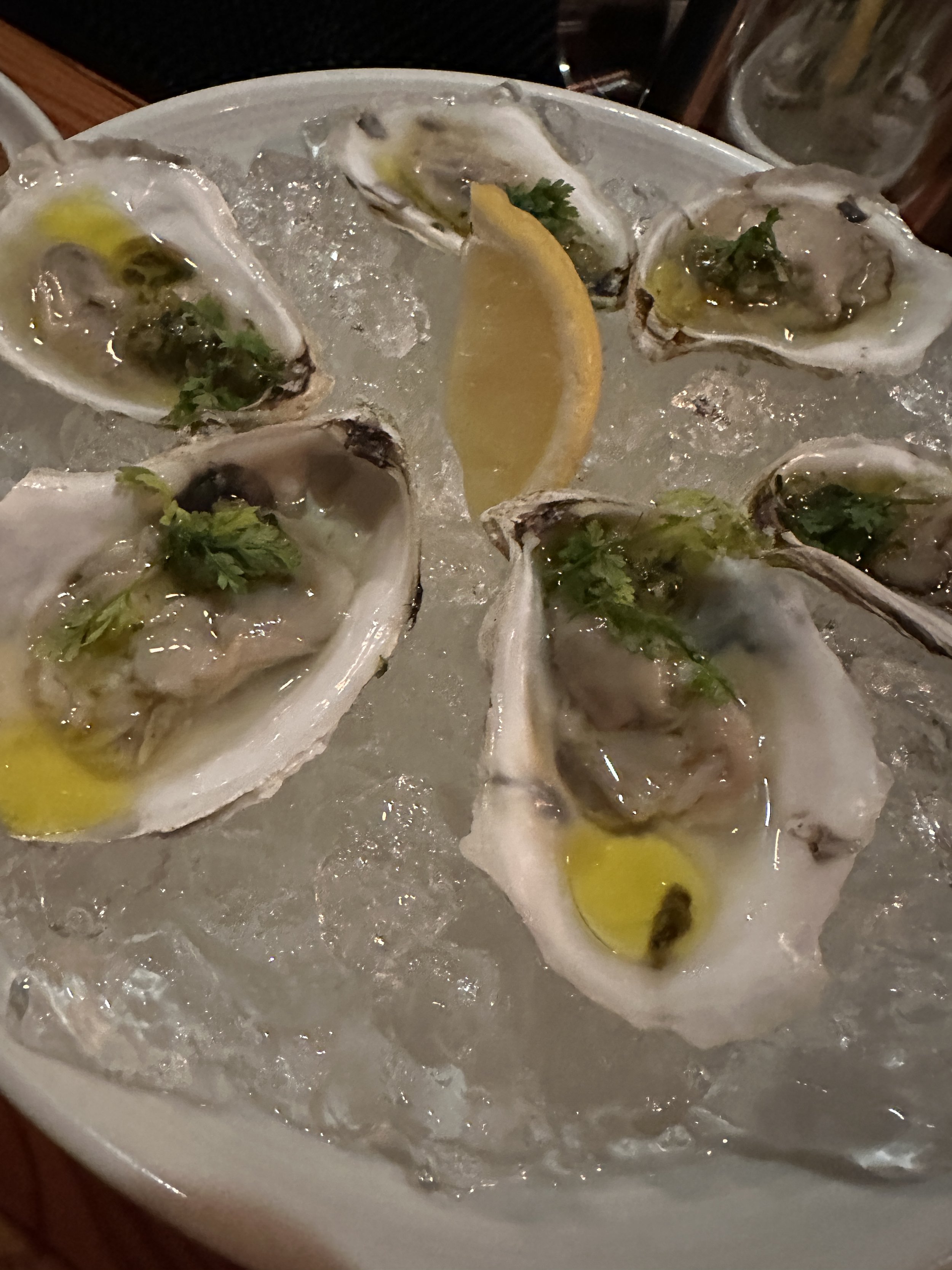 Oyster plate with lemon and garnish