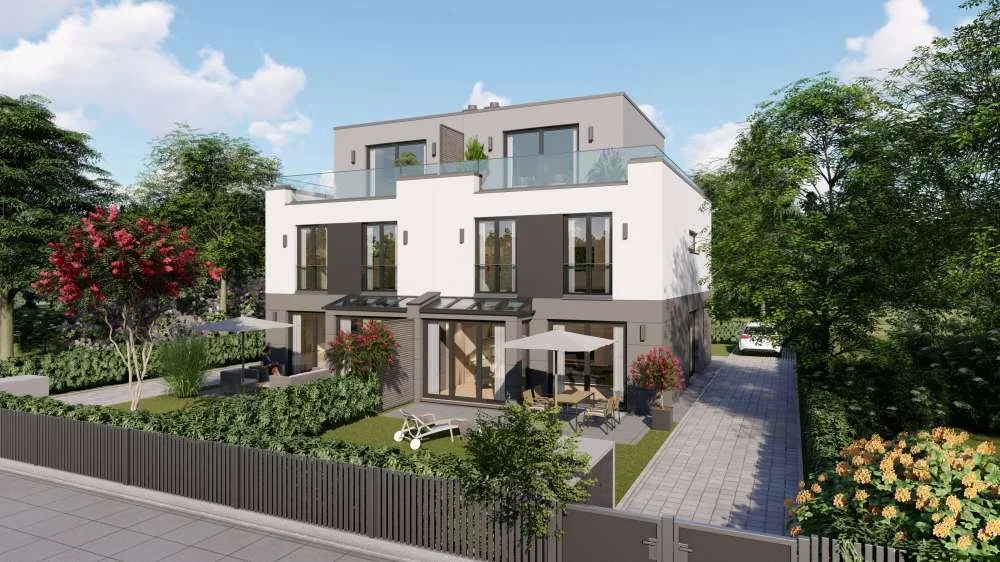 Modern multi-story residential building surrounded by greenery, with outdoor patio areas, umbrellas, and landscaped gardens.