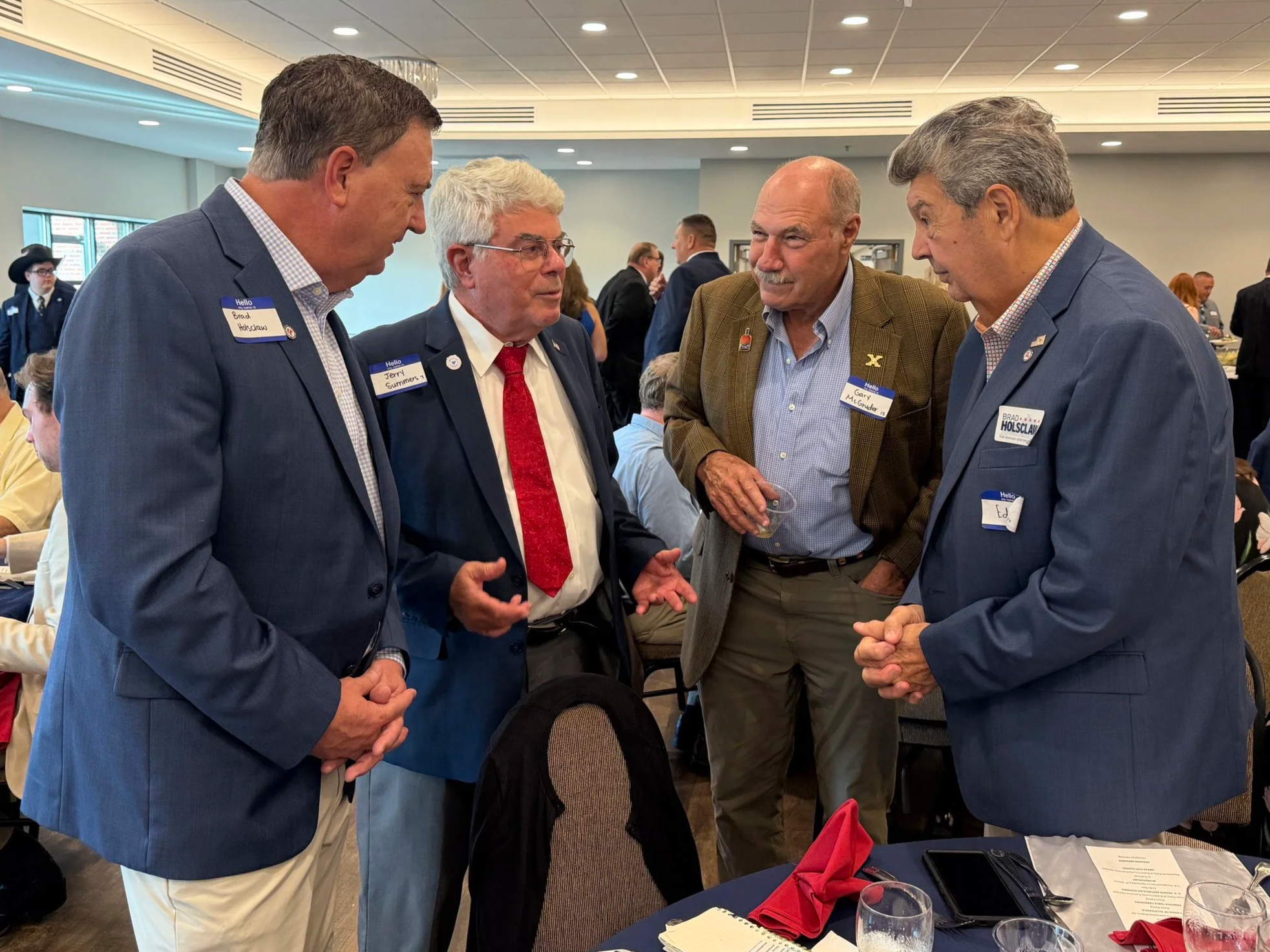 Brad and Ed Holsclaw with Jerry Summers, Judge-Executive of Bullitt County