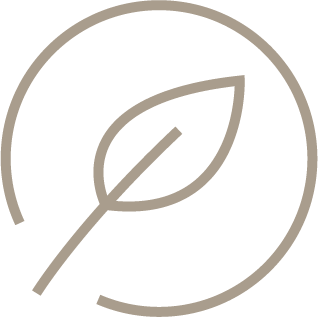 A simple line drawing of a leaf inside a circle.