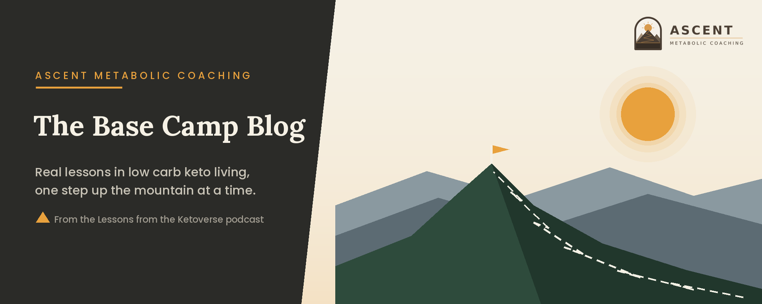 Drawn illustration of a dark green mountain peak with an amber flag at the summit and a dashed trail leading up to it, with grey ranges and a rising sun behind