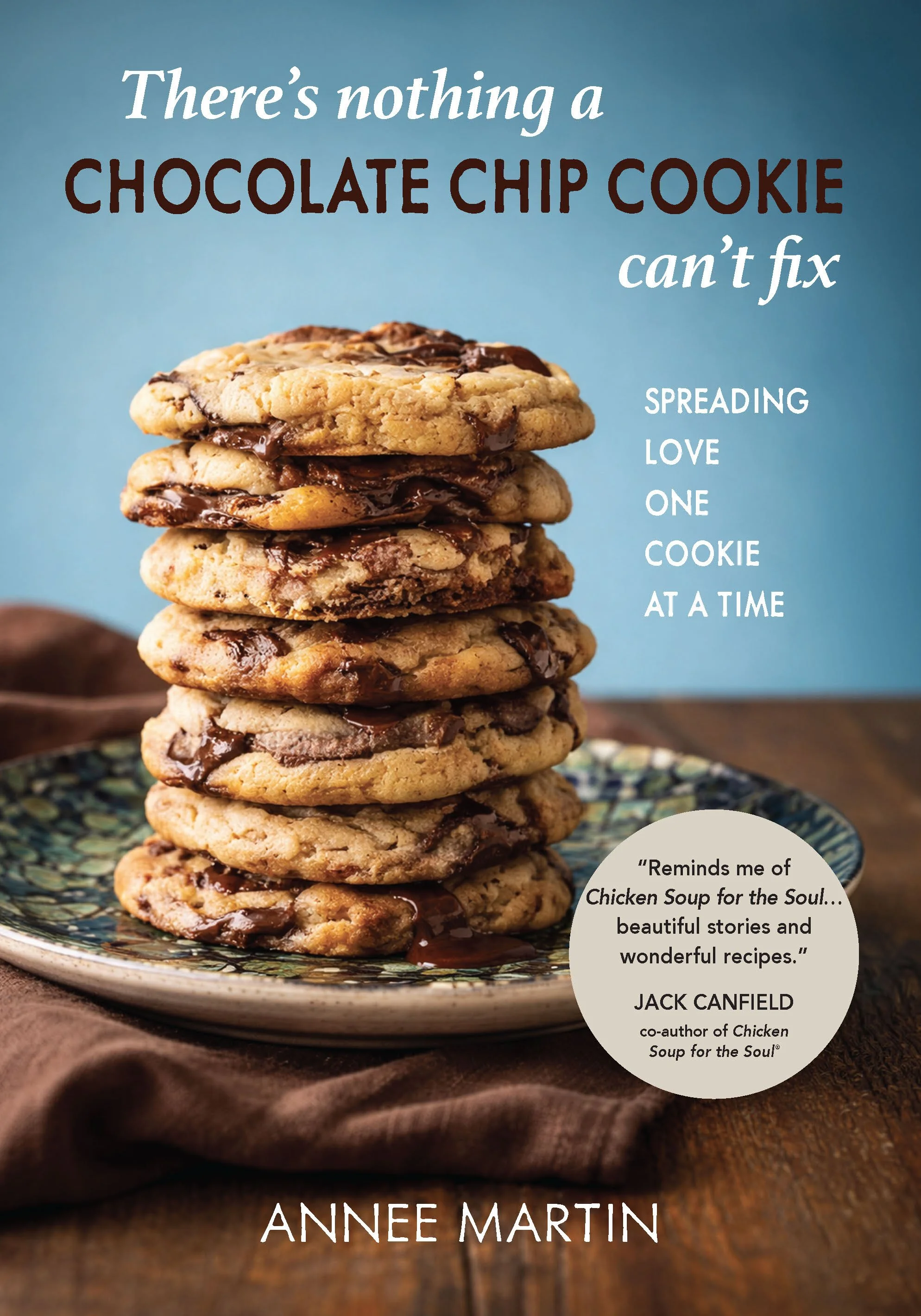 Stack of chocolate chip cookies on a decorative plate with a quote about love and stories, and the name Anne Martin.