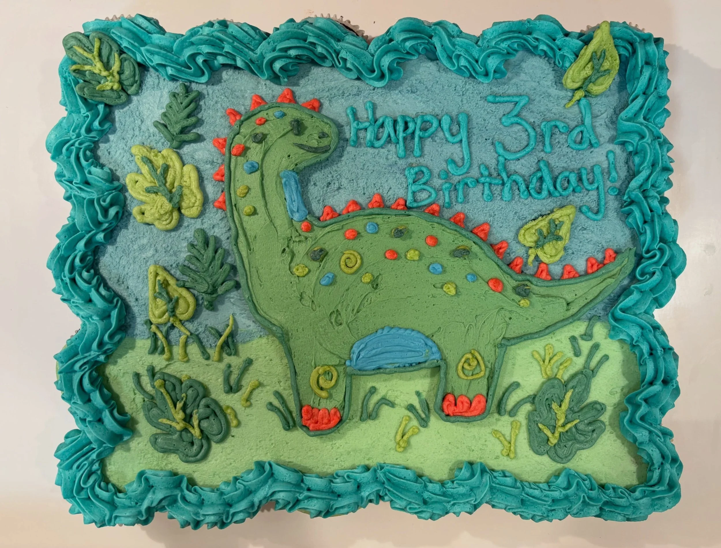 This customer requested a dinosaur pull apart cake! I had never attempted one before but was more than willing to give it a go! I&rsquo;m always willing to try new things for customers! So, if you have an idea you&rsquo;re thinking of let me know!

I