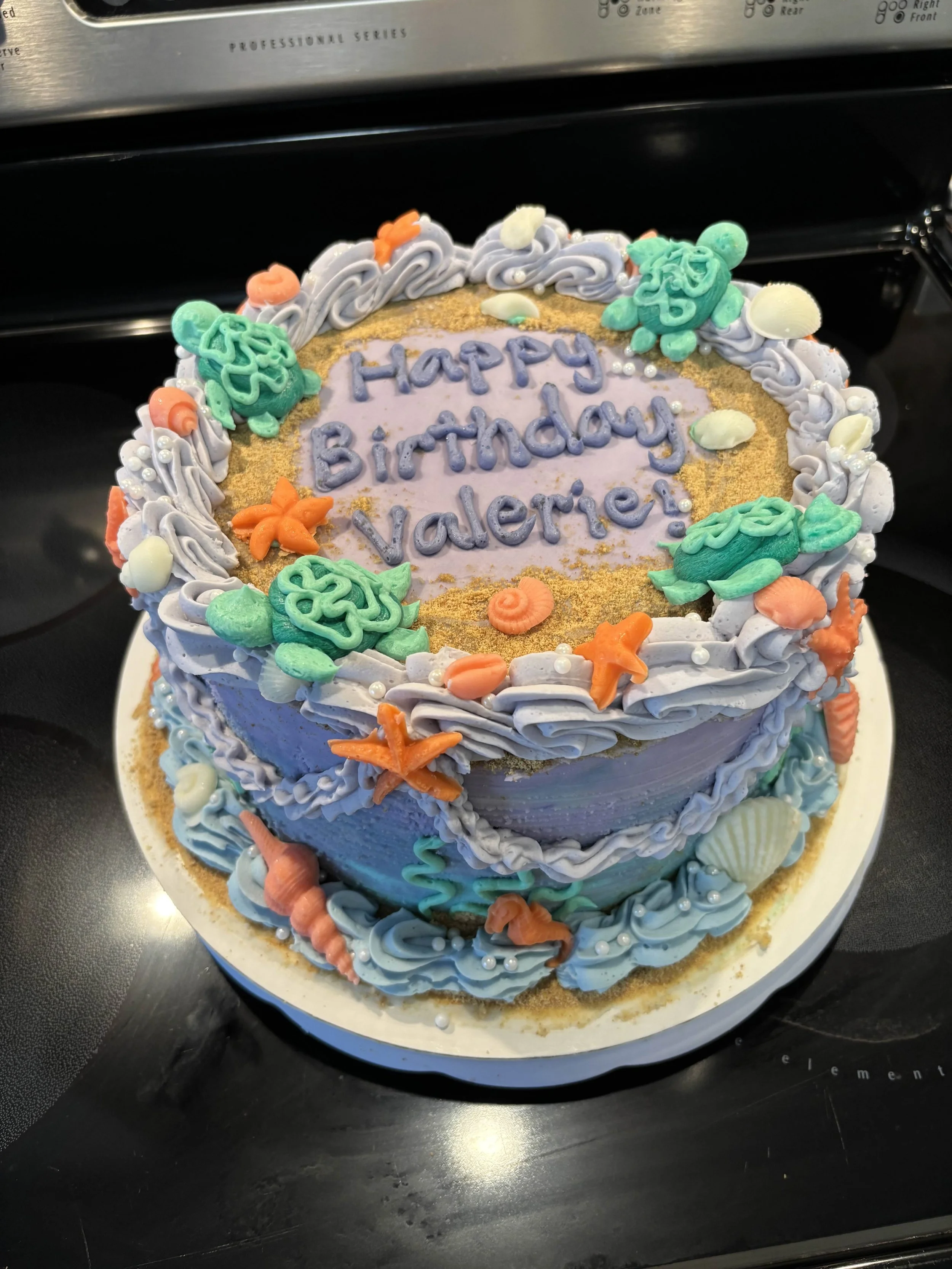 8 inch 3 layer chocolate cake with ganache filing and vanilla buttercream