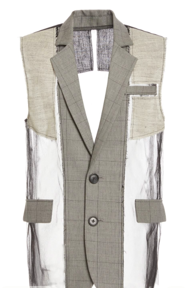 A sleeveless men's vest with a patchwork design of various fabric textures and colors, including plaid, linen, and sheer panels.