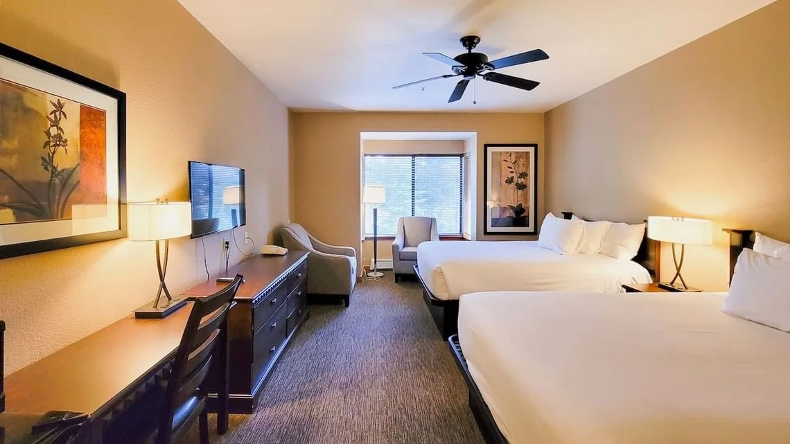 Twin queen bed room.jpg