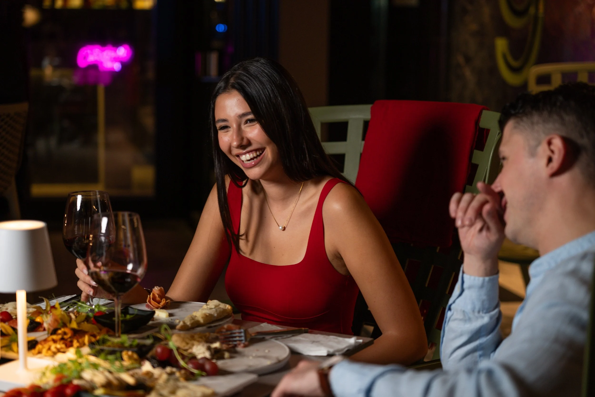 Professional hospitality photography capturing guests enjoying exceptional food, drinks and memorable dining experiences in a restaurant setting in Malta.
