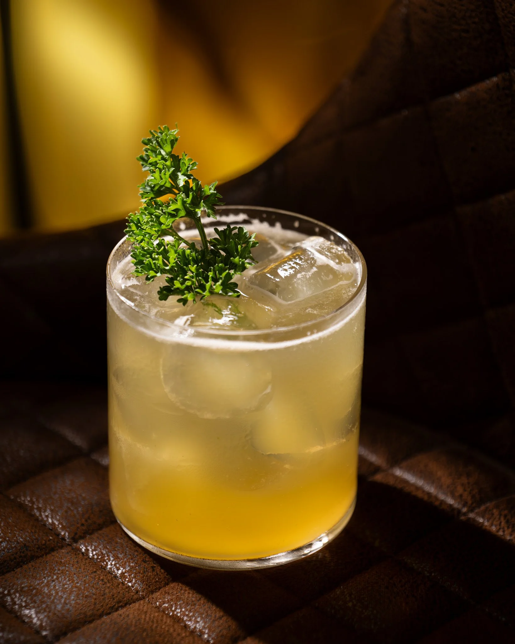 Commercial beverage photography highlighting fresh ingredients and luxury cocktail presentation.