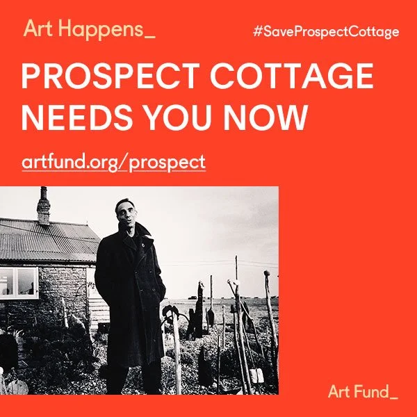 Red poster with white and black text calling for donations to save Prospect Cottage, featuring a black-and-white photograph of a man standing outside near a small house.