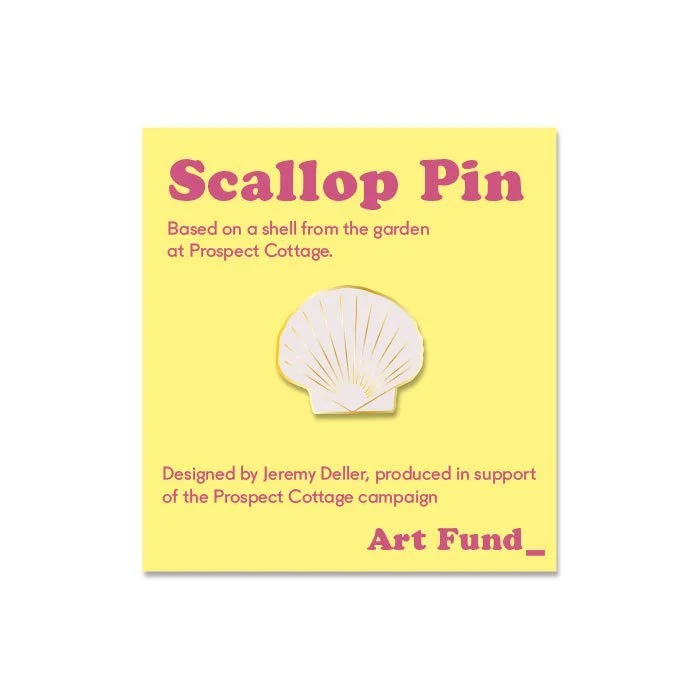 Yellow square card with a white scallop shell illustration in the center. Text on the card reads "Scallop Pin" at the top, with smaller text underneath stating "Based on a shell from the garden at Prospect Cottage." Additional text at the bottom says