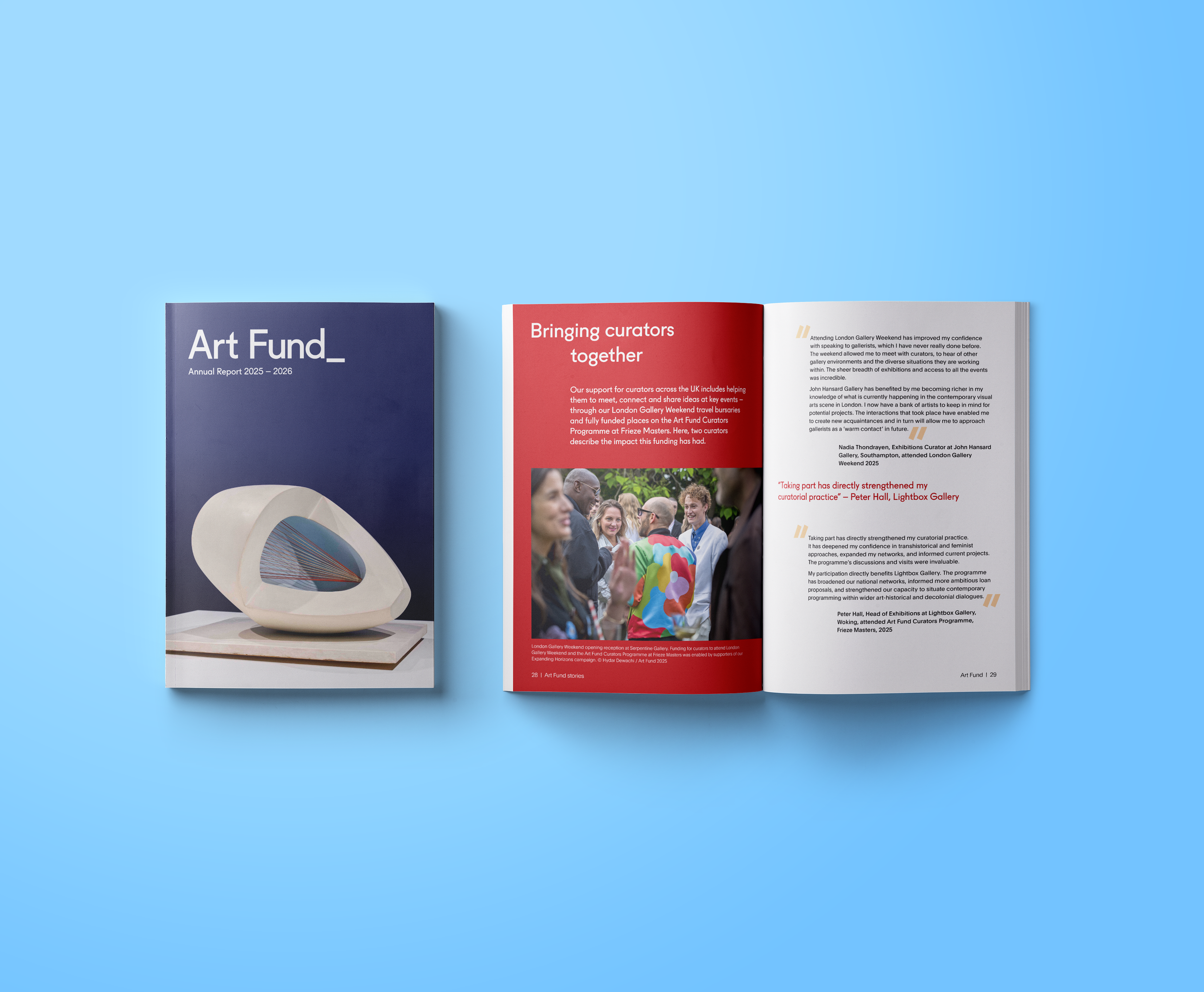 Open art magazine showing a blue cover titled 'Art Fund_ Annual Report 2025-2026' and an inner page with a red header titled 'Bringing curators together' with text and a photo of people at an art event.