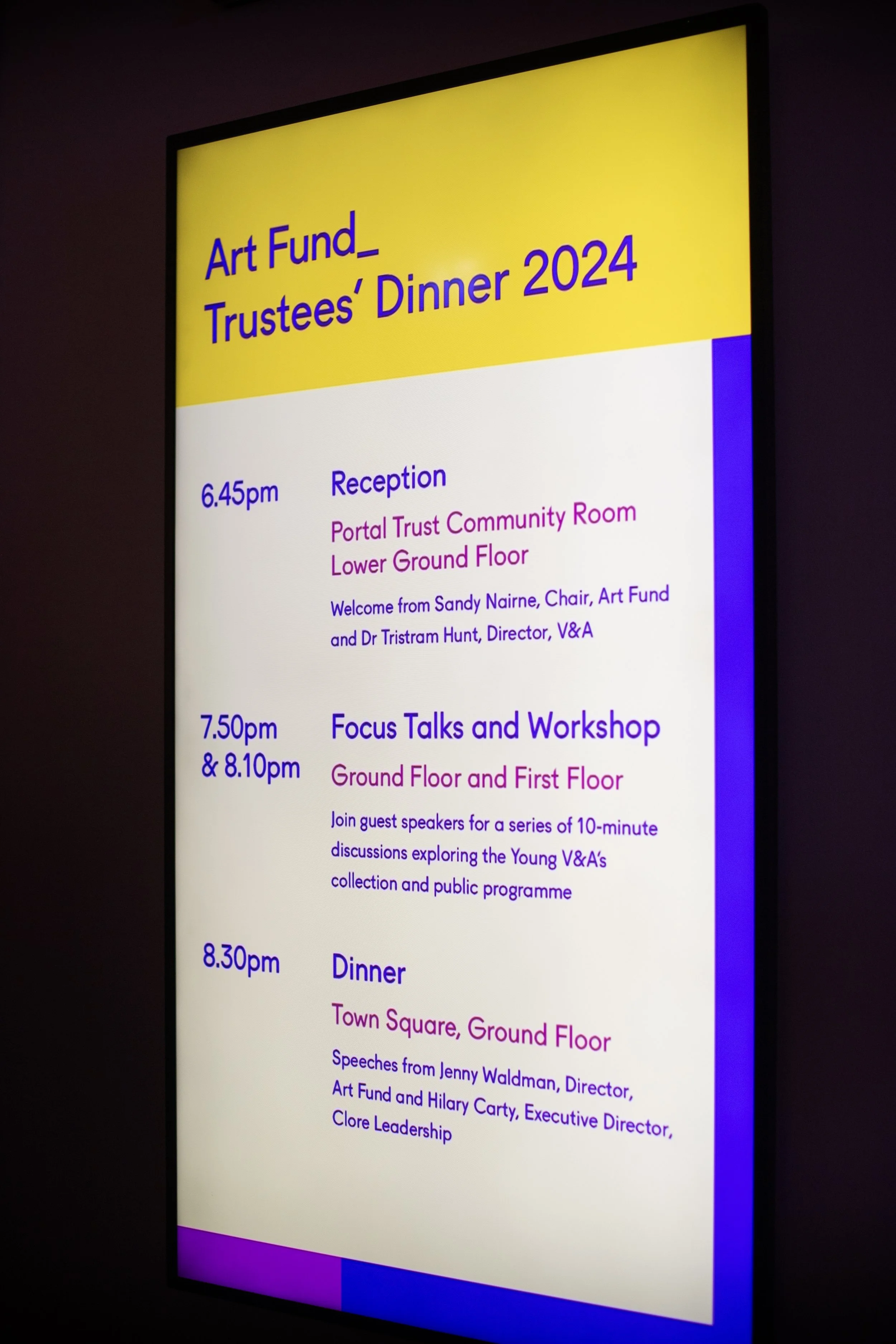 Digital event schedule for the Art Fund Trustees' Dinner 2024, displayed on a screen, with times and locations for various presentations, workshops, and dinner event details.