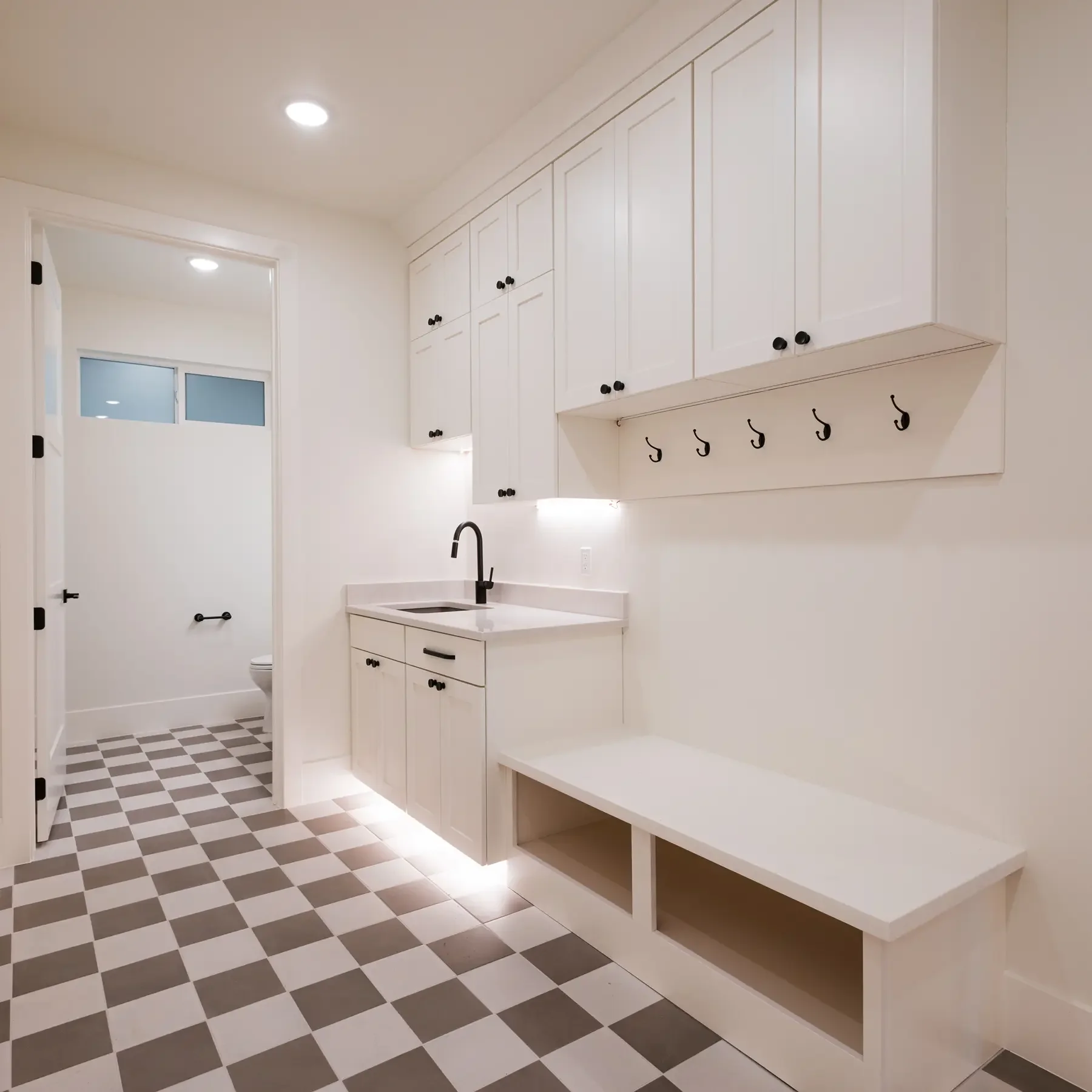 Custom mudroom, with spacious storage and sink in Southern Utah home