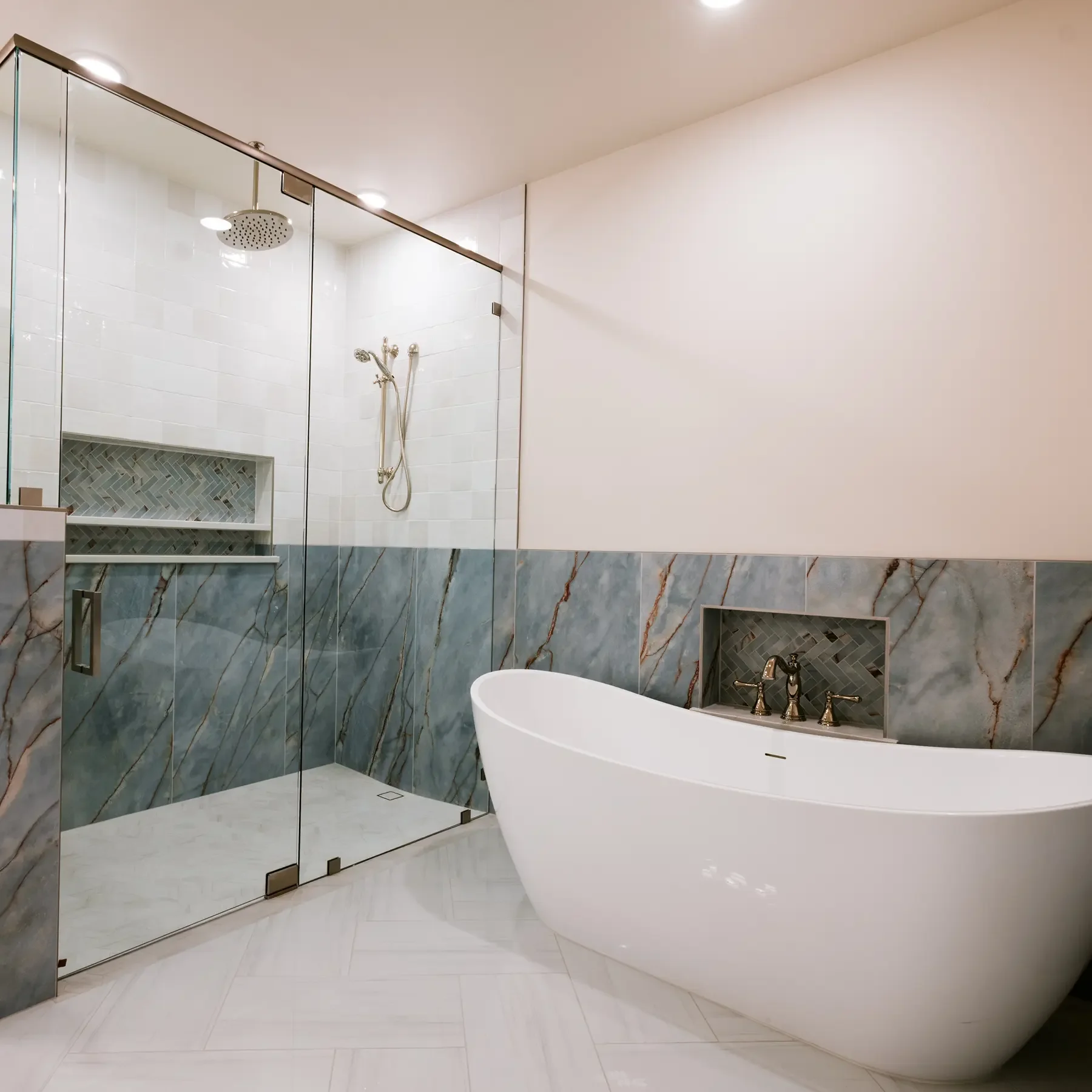 Luxury tile bathroom room, with generous walk in shower and stand alone tub in Southern Utah home