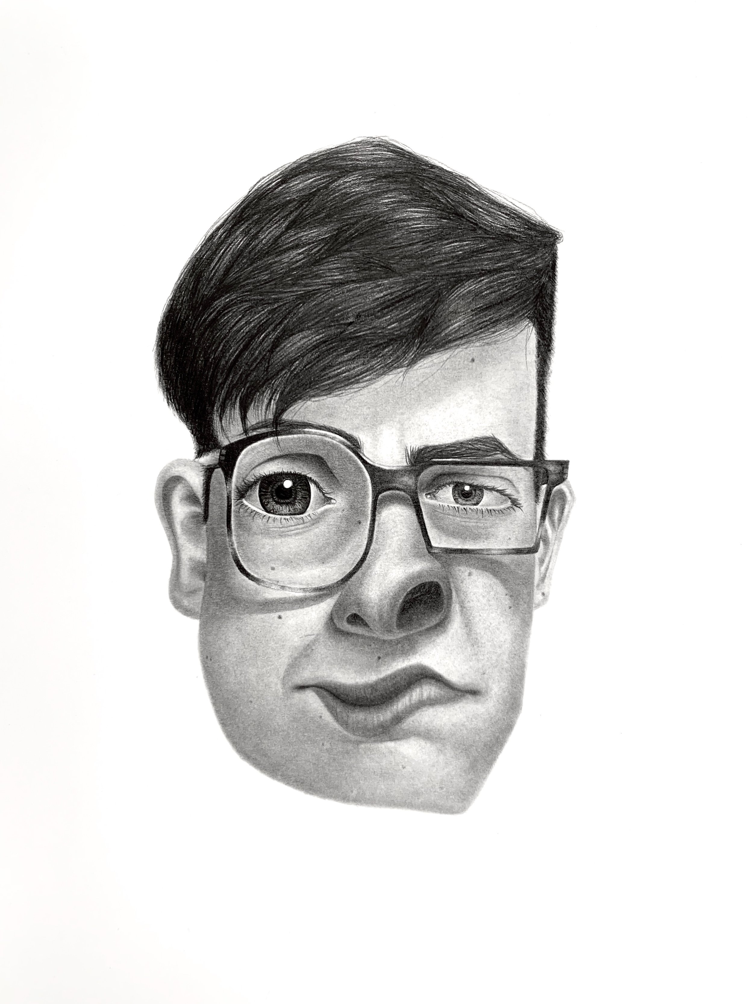Black and white portrait of a young man with short hair, wearing glasses, with one eye winking.