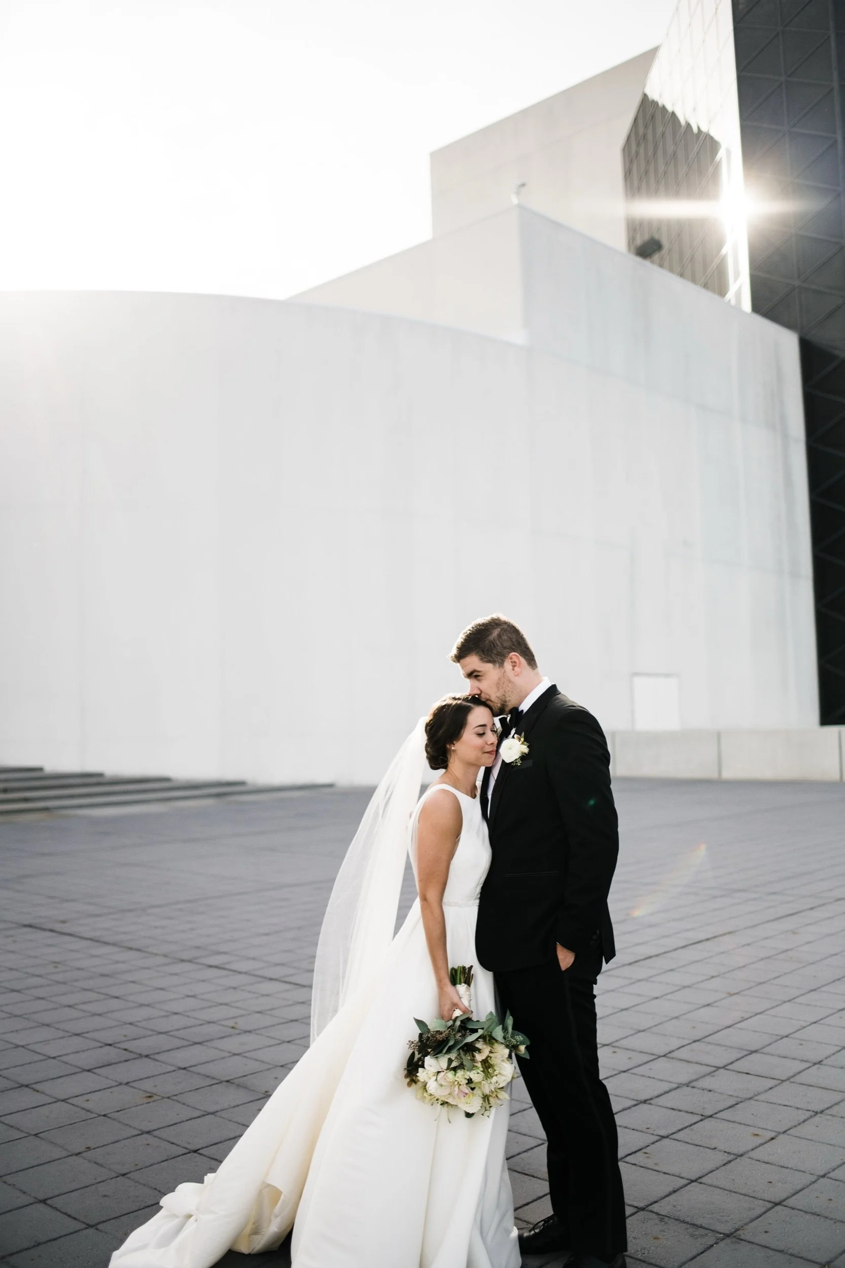 Newlywed couple outside the JFK library and Presidential center