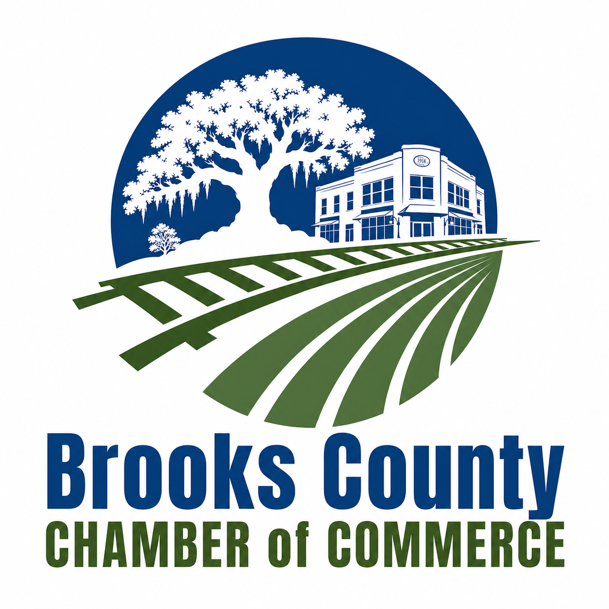 Logo of Brooks County Chamber of Commerce featuring a large tree, a building with an '1918' sign, a smaller tree, and green fields with railroad tracks underneath the tree and building, with text 'Brooks County Chamber of Commerce' below in blue and green.