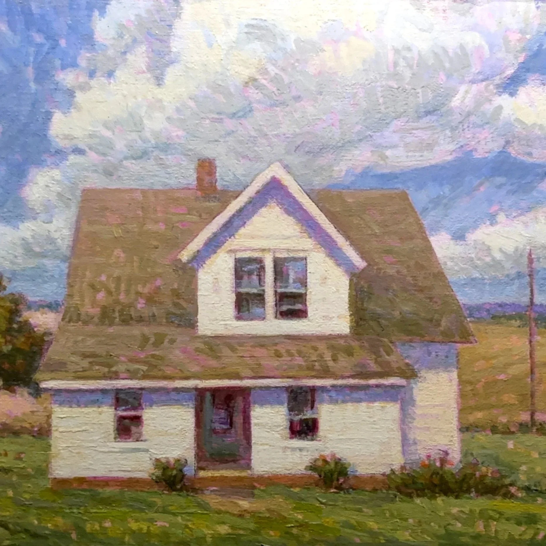 Impressionist painting of a house with a gabled roof, white walls, two windows, and a chimney, set against a cloudy sky with pink and blue hues, surrounded by green grass and small bushes.