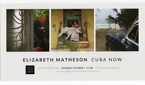 A promotional poster for Elizabeth Matheson's Cuba Now photography exhibit, featuring three photographs: a terracotta pot with flowers, two women in a doorway with a white sheet, and a tropical beach with palm trees and a vintage car.
