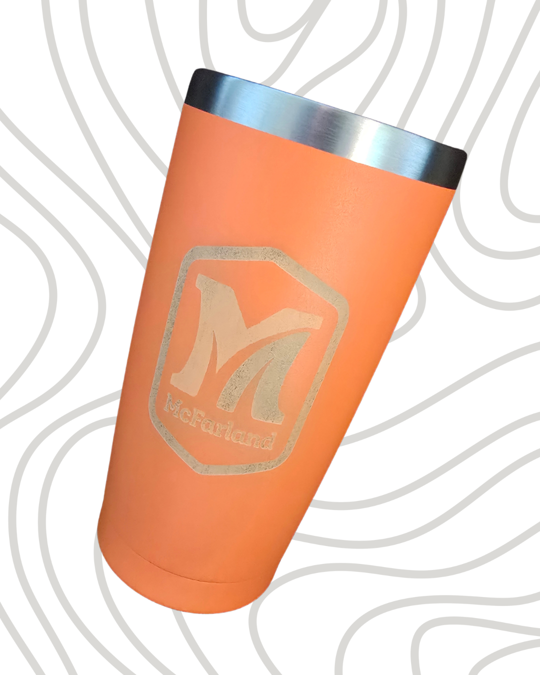 An orange McFarlane tumbler with a silver lid and the McFarlane logo on the front.