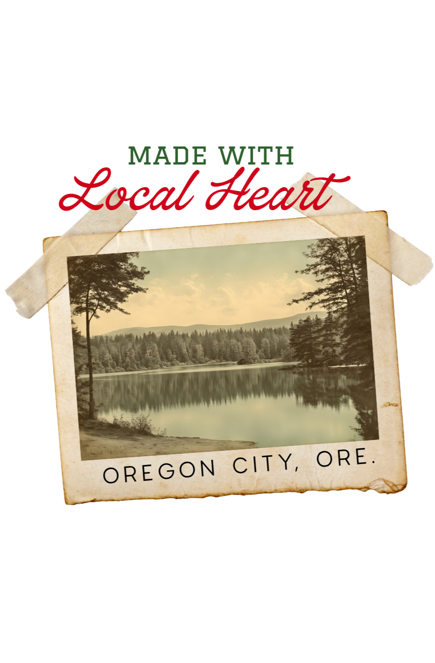 Vintage-style photograph of a serene lake with trees surrounding it, labeled 'Oregon City, Ore.'