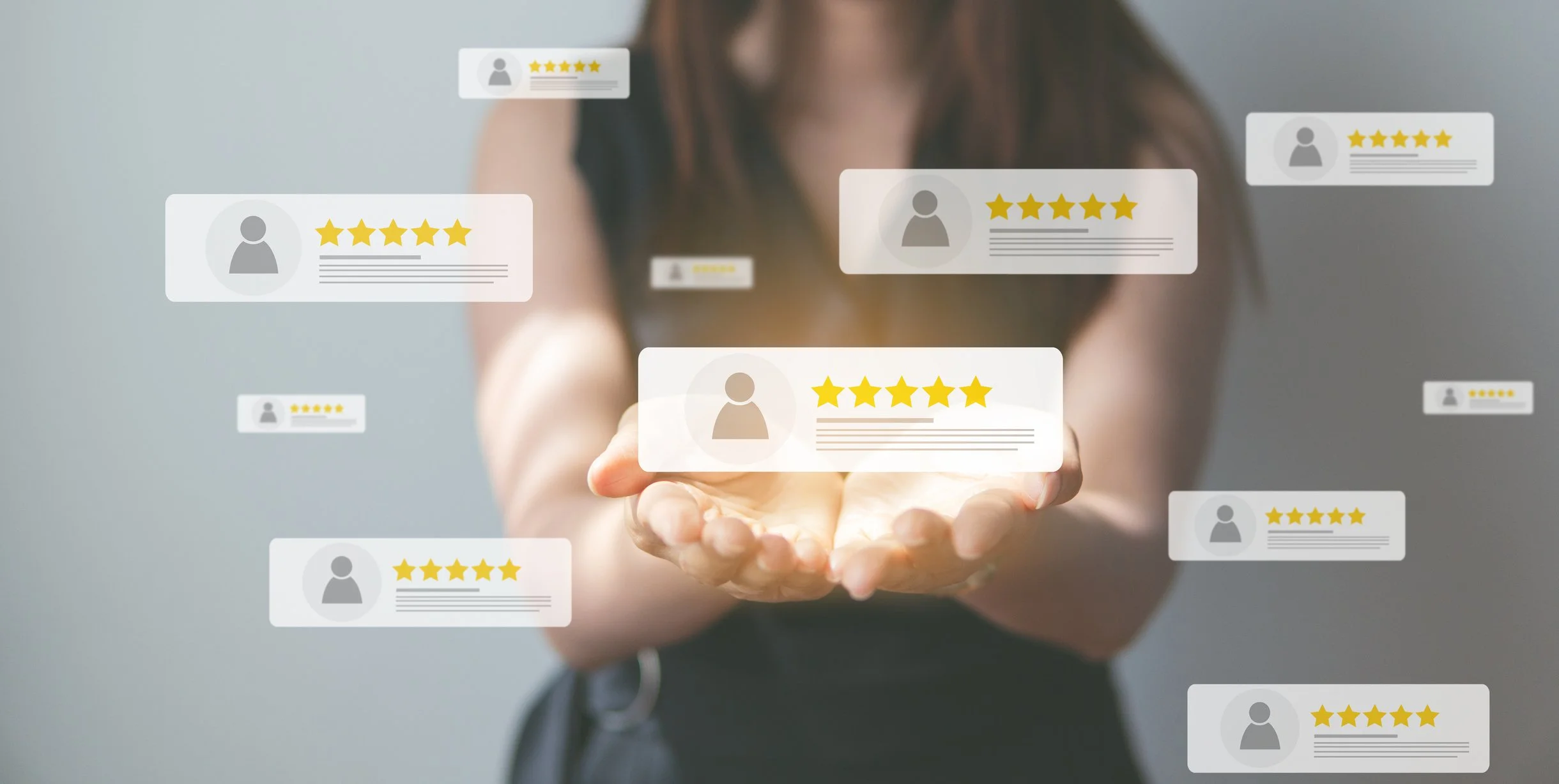 A woman in a gray shirt holding out her hand with digital review icons floating around, each showing a person silhouette and a 5-star rating.