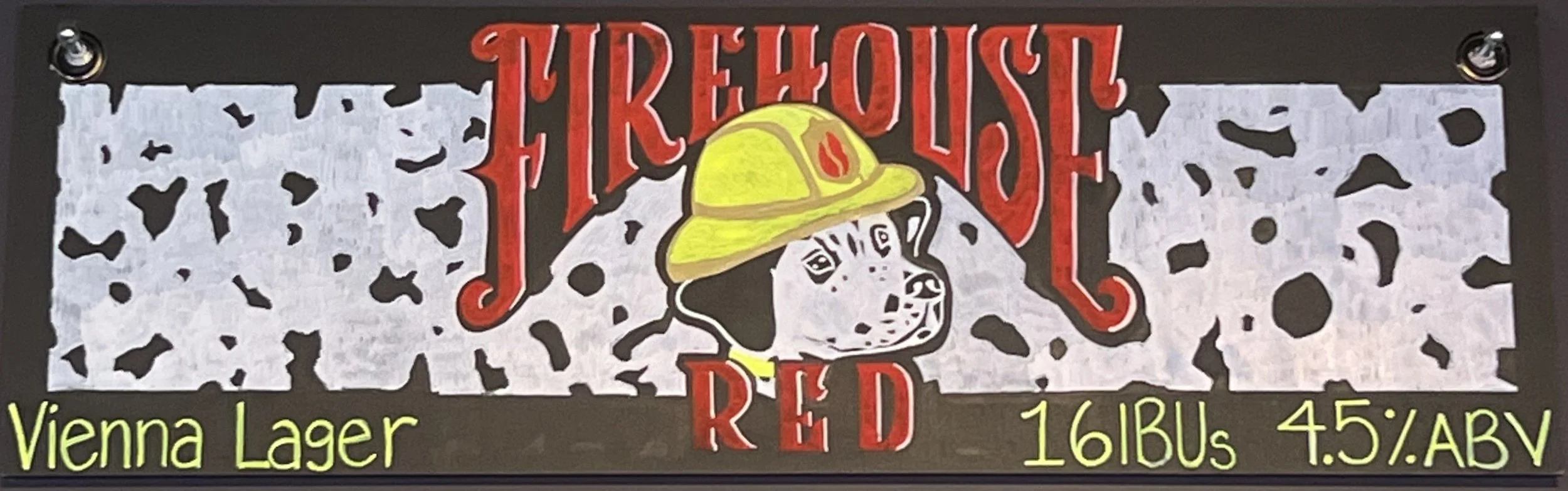 Chalk design of Dalmatian spots in the background with the words firehouse red in red and a drawing of a Dalmatian in a yellow fire hat
