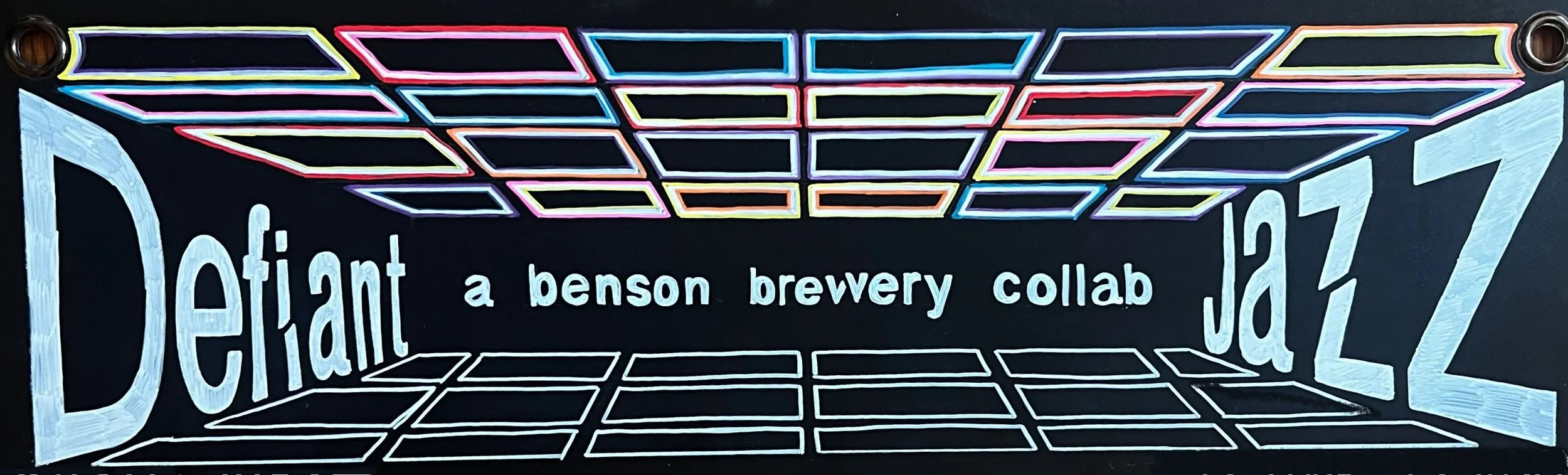 Chalk design of the words Defiant Jazz with multicolor blocks above and white blocks below. In the middle reads 'A Benson Brewery Collab'
