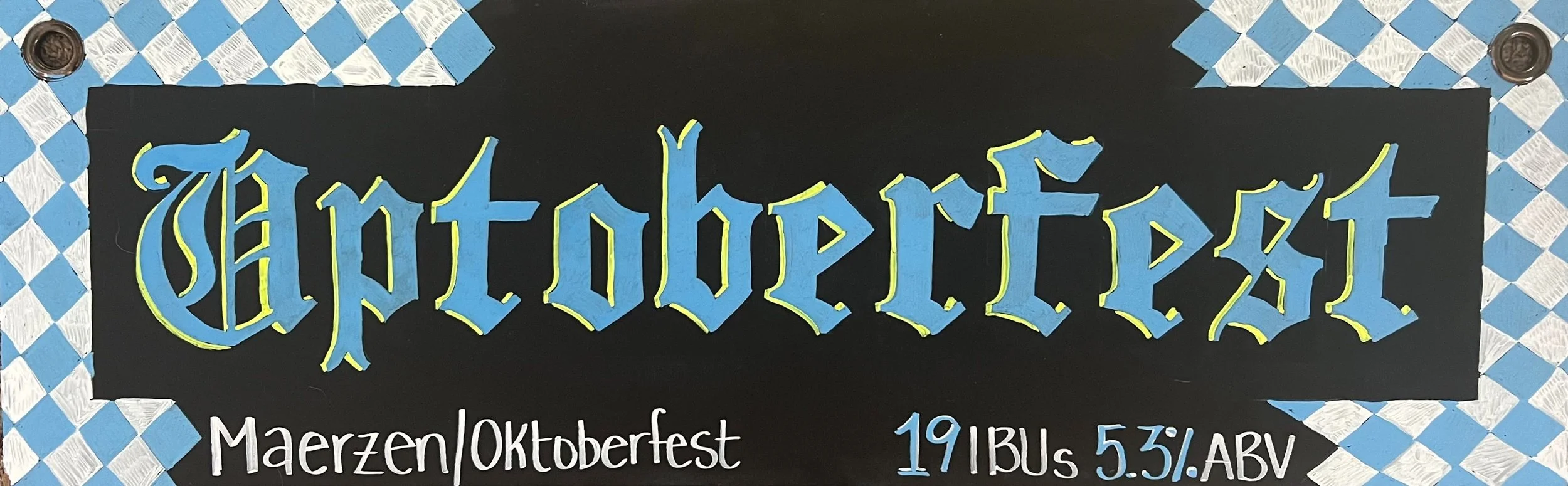 Chalk design that says "Uptoberfest" in a German-style font. An argyle design in white and blue along the border. Says Maerzen/Oktoberfest at the bottom.