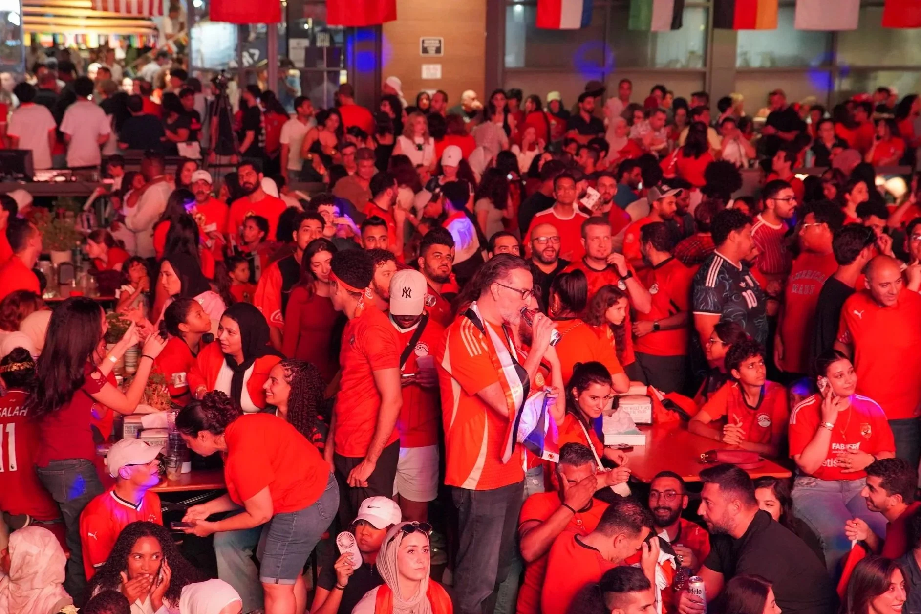 Egyptian soccer fans gathered at an Egypt DFW community watch party in Dallas–Fort Worth, celebrating Egypt together through soccer, culture, and community.
